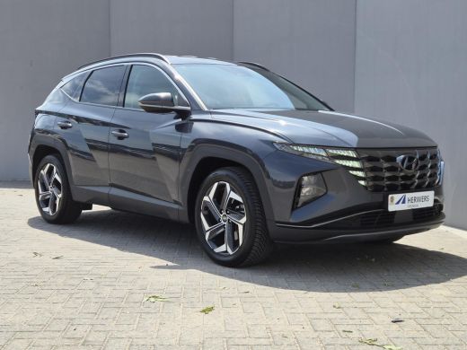 Hyundai Tucson 1.6 T-GDI PHEV Comfort Smart 4WD / Dealer onderhouden / Fabrieksgarantie tot 05-2027 / All season... ActivLease financial lease