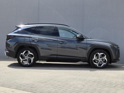 Hyundai Tucson 1.6 T-GDI PHEV Comfort Smart 4WD / Fabrieksgarantie tot 02-2029 / Dealer onderhouden / Glazen sch... ActivLease financial lease