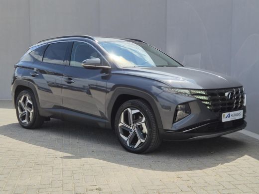 Hyundai Tucson 1.6 T-GDI PHEV Comfort Smart 4WD / Fabrieksgarantie tot 02-2029 / Dealer onderhouden / Glazen sch... ActivLease financial lease