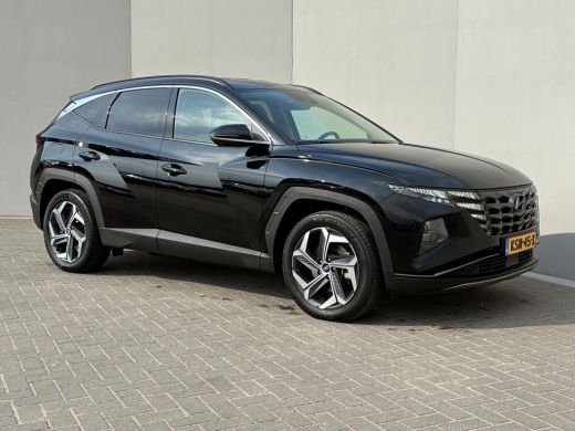 Hyundai Tucson 1.6 T-GDI PHEV Comfort Smart 4WD / Fabrieksgarantie tot 05-2027 / Dealer onderhouden / Navigatie ... ActivLease financial lease
