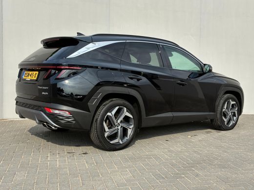 Hyundai Tucson 1.6 T-GDI PHEV Comfort Smart 4WD / Fabrieksgarantie tot 05-2027 / Dealer onderhouden / Navigatie ... ActivLease financial lease