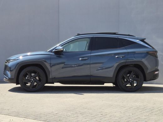 Hyundai Tucson 1.6 T-GDI PHEV Premium Sky 4WD / Glazen schuif- en kanteldak / Rondomzicht camera / Trekgewicht 1... ActivLease financial lease