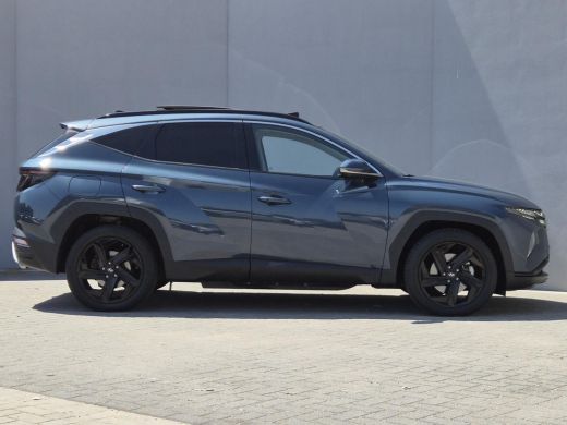 Hyundai Tucson 1.6 T-GDI PHEV Premium Sky 4WD / Glazen schuif- en kanteldak / Rondomzicht camera / Trekgewicht 1... ActivLease financial lease