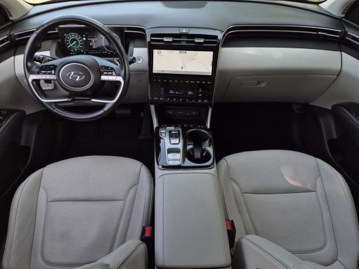 Hyundai Tucson 1.6 T-GDI PHEV Premium Sky 4WD / Glazen schuif- en kanteldak / Rondomzicht camera / Trekgewicht 1... ActivLease financial lease