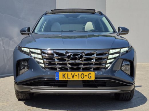 Hyundai Tucson 1.6 T-GDI PHEV Premium Sky 4WD / Glazen schuif- en kanteldak / Rondomzicht camera / Trekgewicht 1... ActivLease financial lease