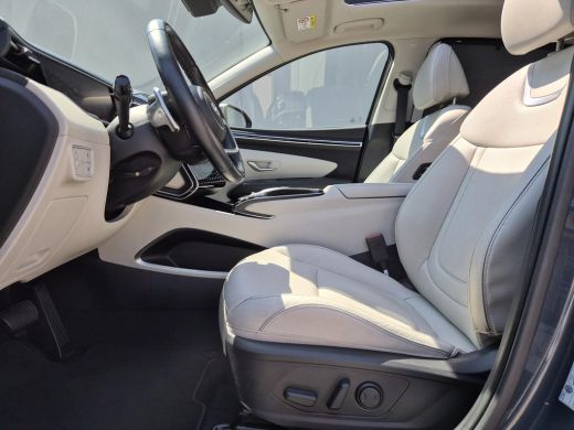 Hyundai Tucson 1.6 T-GDI PHEV Premium Sky 4WD / Glazen schuif- en kanteldak / Rondomzicht camera / Trekgewicht 1... ActivLease financial lease