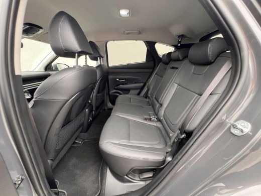 Hyundai Tucson 1.6 T-GDI PHEV Premium 4WD / Accu SoH 100 % / EAER 65 km / Leder / HUD / Navigatie / Apple Carpla... ActivLease financial lease