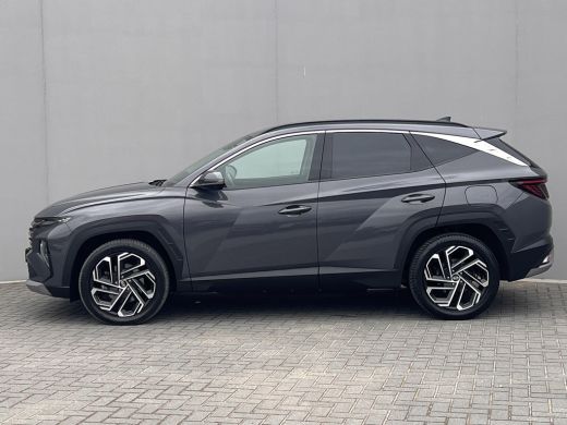 Hyundai Tucson 1.6 T-GDI PHEV Premium 4WD / Accu SoH 100 % / EAER 65 km / Leder / HUD / Navigatie / Apple Carpla... ActivLease financial lease