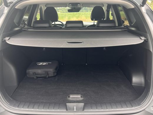Hyundai Tucson 1.6 T-GDI PHEV Premium 4WD / Accu SoH 100 % / EAER 65 km / Leder / HUD / Navigatie / Apple Carpla... ActivLease financial lease