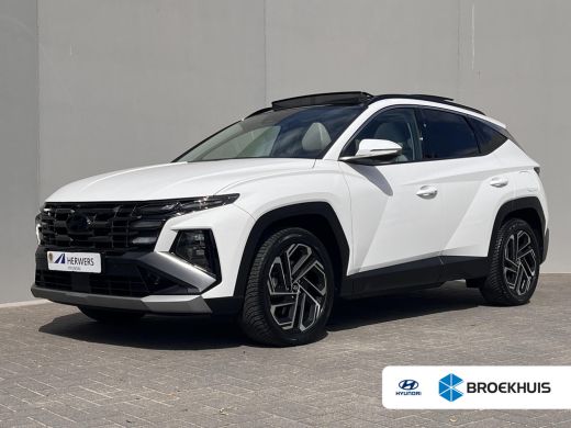 Hyundai Tucson 1.6 T-GDI PHEV Premium Sky 4WD / Accu SoH 100 % / Panorama schuifdak / Wit leder / HUD / Camera /... ActivLease financial lease