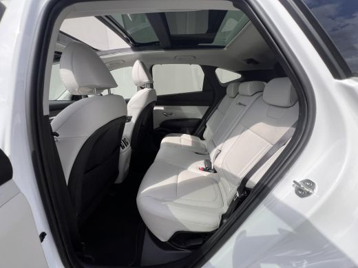 Hyundai Tucson 1.6 T-GDI PHEV Premium Sky 4WD / Accu SoH 100 % / Panorama schuifdak / Wit leder / HUD / Camera /... ActivLease financial lease