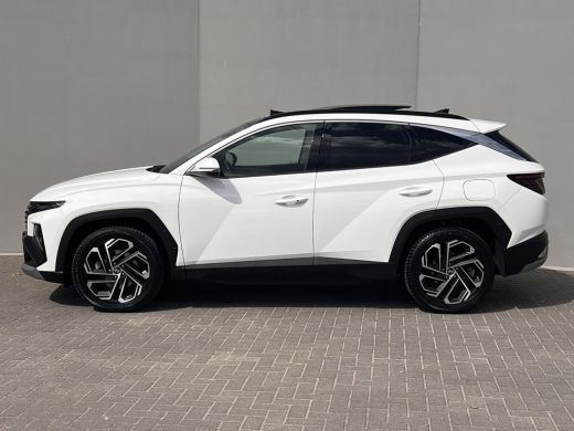 Hyundai Tucson 1.6 T-GDI PHEV Premium Sky 4WD / Accu SoH 100 % / Panorama schuifdak / Wit leder / HUD / Camera /... ActivLease financial lease