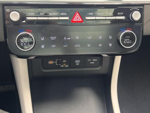 Hyundai Tucson 1.6 T-GDI PHEV Premium Sky 4WD / Accu SoH 100 % / Panorama schuifdak / Wit leder / HUD / Camera /... ActivLease financial lease