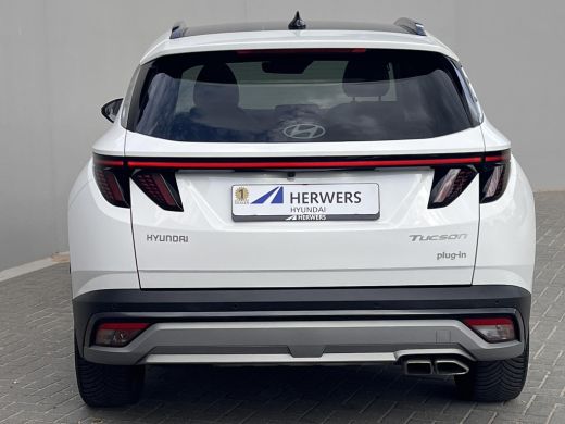 Hyundai Tucson 1.6 T-GDI PHEV Premium Sky 4WD / Accu SoH 100 % / Panorama schuifdak / Wit leder / HUD / Camera /... ActivLease financial lease