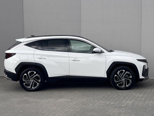 Hyundai Tucson 1.6 T-GDI PHEV Premium Sky 4WD / Accu SoH 100 % / Panorama schuifdak / Wit leder / HUD / Camera /... ActivLease financial lease