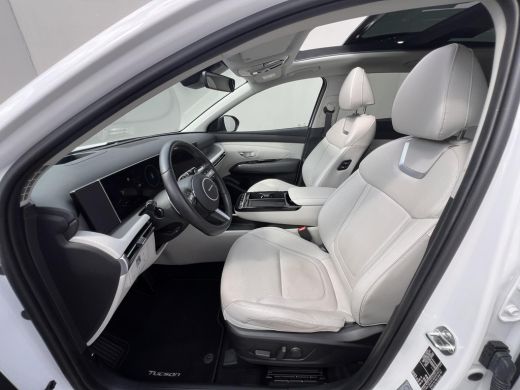 Hyundai Tucson 1.6 T-GDI PHEV Premium Sky 4WD / Accu SoH 100 % / Panorama schuifdak / Wit leder / HUD / Camera /... ActivLease financial lease
