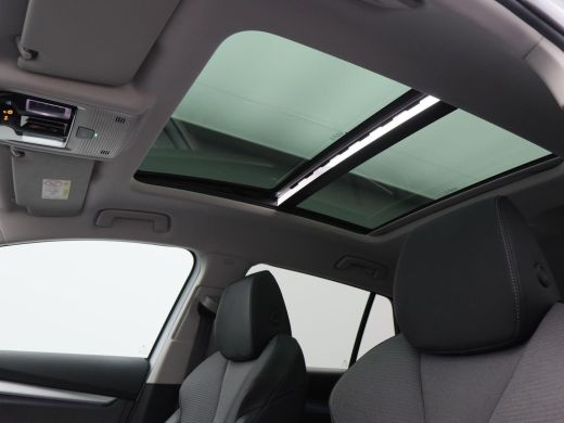 Skoda Enyaq iV 60 180 Pk | Panoramadak | Crystal Light LED | Stuur- en Stoelverwarming | Privacy Glass | Camera ... ActivLease financial lease