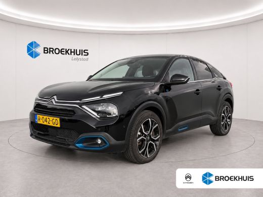 Citroën &euml;-C4 &Euml;-C4 50KWH 136PK SHINE AUTOMAAT SOH 90,19% / NAVI / LEDER / CLIMA / LED / PDC / 18" LMV / CAMERA ... ActivLease financial lease