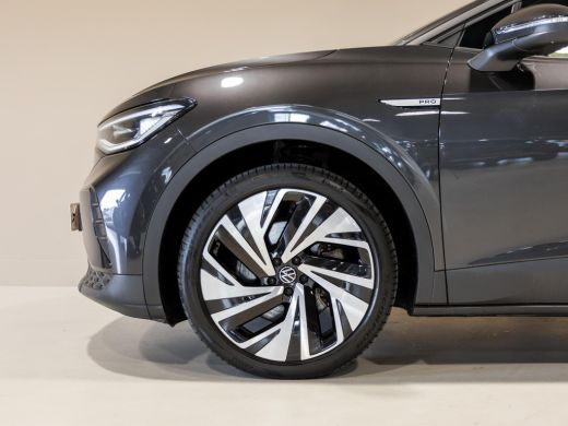 Volkswagen ID.4 Max 77 kWh SOH 91% / 204pk / Panorama dak / Trekhaak / Kuipstoelen / Elektrische stoelverstelling / ActivLease financial lease