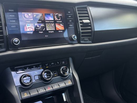 Skoda Kodiaq 1.5 TSI Sportline Business 7p. | Trekhaak | Pano | Sfeerverlichting | Apple Carplay | Stoelverwar... ActivLease financial lease