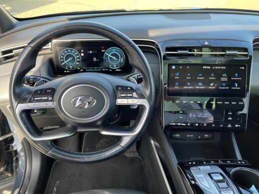 Hyundai Tucson 1.6 T-GDI PHEV Premium Sky 4WD | Schuif-/kanteldak | Stoelverwarming V+A | Stuurverwarming | 360&deg;... ActivLease financial lease