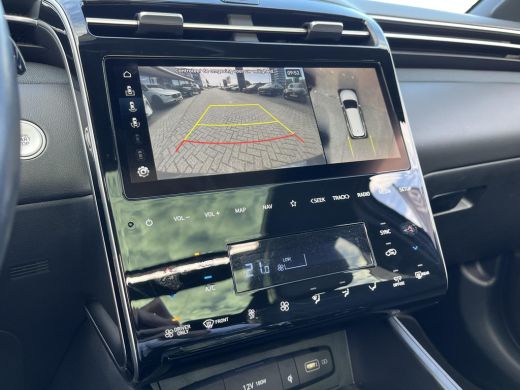 Hyundai Tucson 1.6 T-GDI PHEV Premium Sky 4WD | Schuif-/kanteldak | Stoelverwarming V+A | Stuurverwarming | 360&deg;... ActivLease financial lease