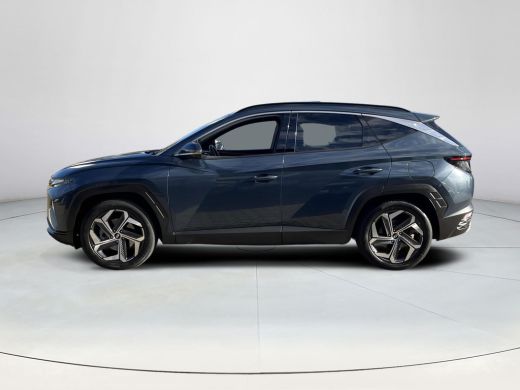Hyundai Tucson 1.6 T-GDI PHEV Premium Sky 4WD | Schuif-/kanteldak | Stoelverwarming V+A | Stuurverwarming | 360&deg;... ActivLease financial lease