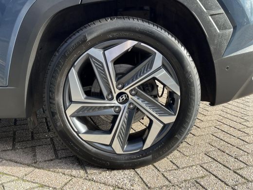 Hyundai Tucson 1.6 T-GDI PHEV Premium Sky 4WD | Schuif-/kanteldak | Stoelverwarming V+A | Stuurverwarming | 360&deg;... ActivLease financial lease