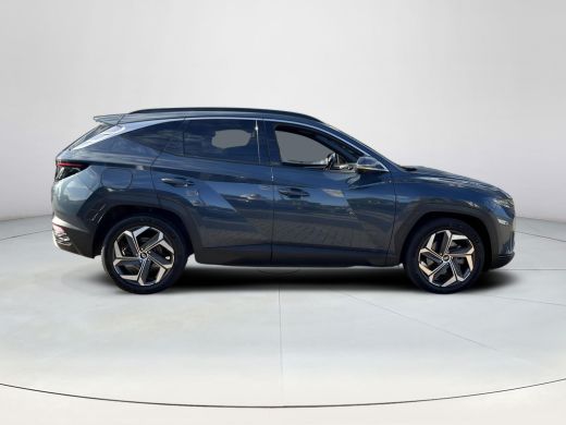 Hyundai Tucson 1.6 T-GDI PHEV Premium Sky 4WD | Schuif-/kanteldak | Stoelverwarming V+A | Stuurverwarming | 360&deg;... ActivLease financial lease