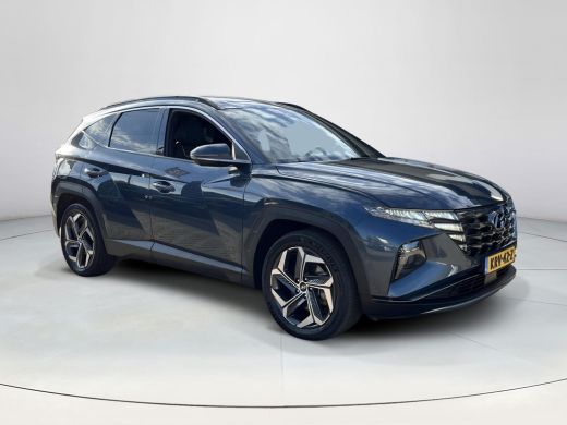 Hyundai Tucson 1.6 T-GDI PHEV Premium Sky 4WD | Schuif-/kanteldak | Stoelverwarming V+A | Stuurverwarming | 360&deg;... ActivLease financial lease