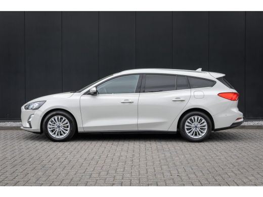 Ford Focus 1.0 EcoBoost Titanium Automaat | 100% dealer o.h. | Adaptieve cruise | Trekhaak | Winter-pack | E... ActivLease financial lease