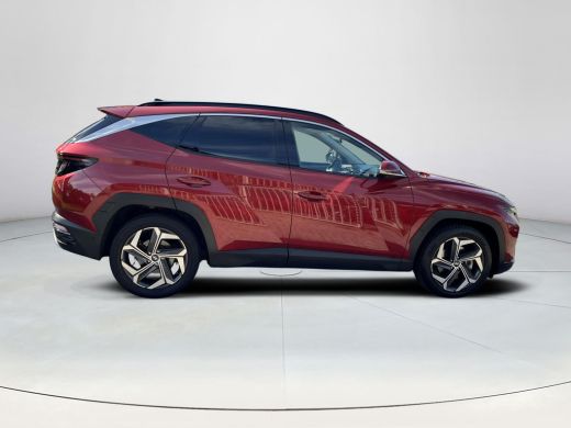 Hyundai Tucson 1.6 T-GDI HEV Premium Sky | Rijklaarprijs | Panoramadak | Leer | Elektrisch verstelbare, verwarmd... ActivLease financial lease