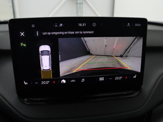 Skoda Enyaq iV | SOH 93,3% | Leder/alcantara | Stuur/stoel verwarming | Cruise control | Carplay | Camera | Park... ActivLease financial lease
