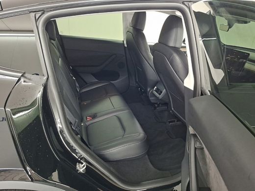 Tesla Model Y RWD 58 kWh | Panoramadak | Voorstoelen verwarmd | Keyless | Dodehoek detectie | Cruise control ad... ActivLease financial lease