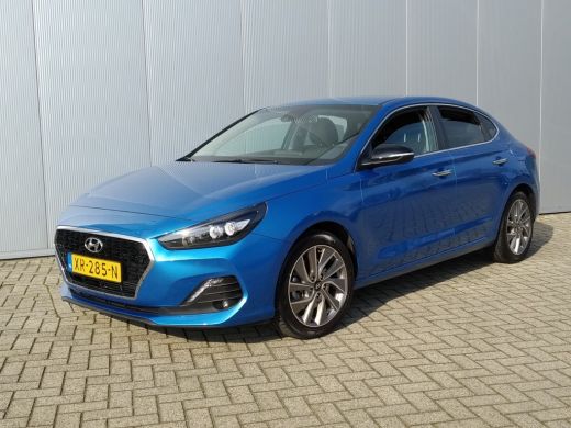 Hyundai i30 Fastback 1.4 T-GDI Premium | Navigatie DAB+ | Cruise Control | Climate control | Full LED | Parke... Hyundai i30 Fastback 1.4 T-GDI Premium | Navigatie DAB+ | Cruise Control | Climate control | Full LED | Parke...