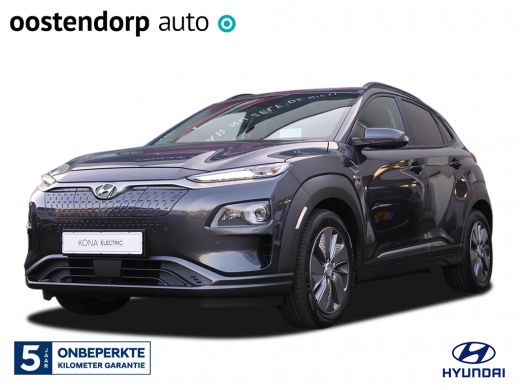 Hyundai Kona EV Premium 64 kWh Automaat | Navigatie | 3-fase laden | Achteruitrijcamera Direct uit voorraad le... Hyundai Kona EV Premium 64 kWh Automaat | Navigatie | 3-fase laden | Achteruitrijcamera Direct uit voorraad le...