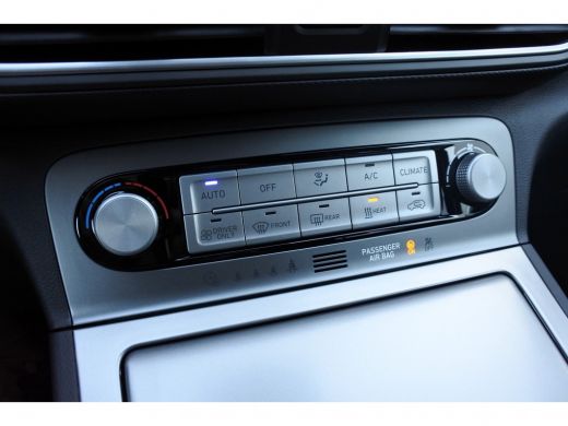 Hyundai Kona EV Premium 64 kWh Automaat | Elektrisch schuif-/kanteldak| 3-fase laden | Achteruitrijcamera Dire... ActivLease financial lease